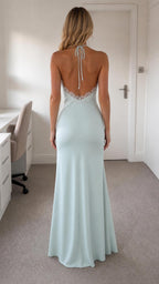 Light blue satin maxi dress back view showing open back
