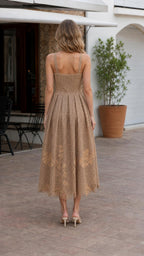Back view of model wearing khaki floral lace midi dress