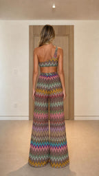 Back view of model wearing multi-color chevron knit two-piece set