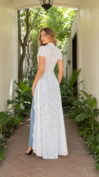 Back view of white floral lace fitted maxi top with high neckline and long hem