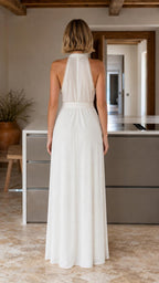 Back view of white maxi dress with sheer upper panel