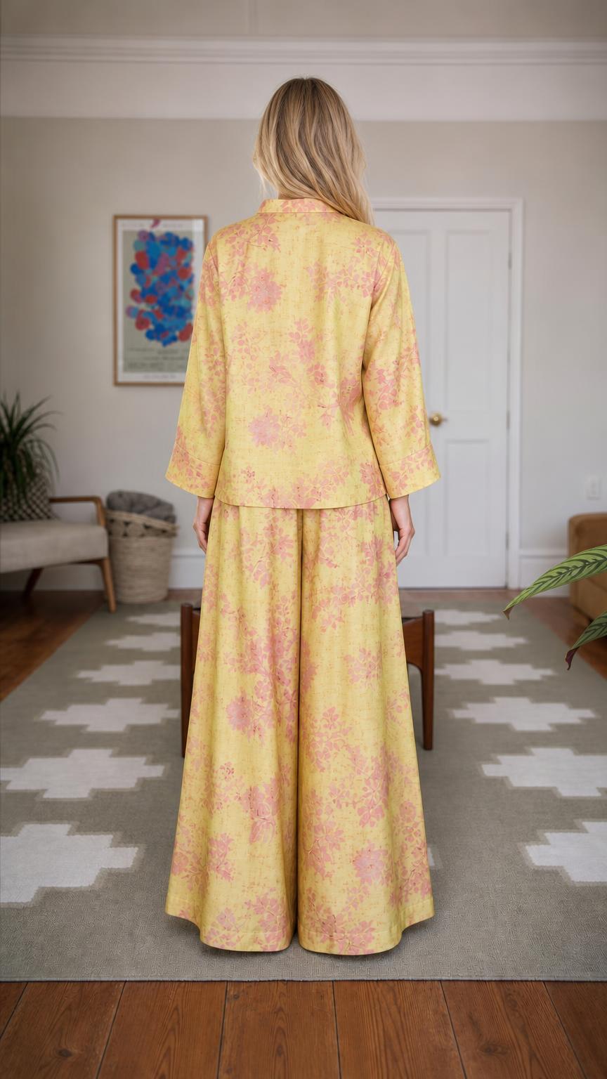 Back view of woman wearing yellow floral brocade set