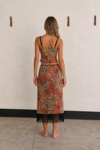 Back view of woman wearing Red Multi paisley two piece set