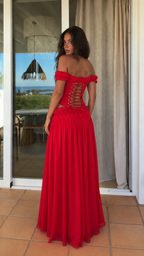 Back view of red set showing lace-up corset detail and full skirt