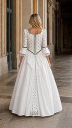Back view showing intricate details of white Renaissance dress