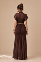Back view showing the ruched back and tiered skirt details