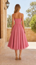 Back view of pink A-line midi dress