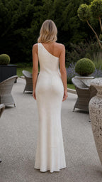 Back view of white one-shoulder maxi dress