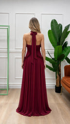 Back view of burgundy halter pleated maxi dress