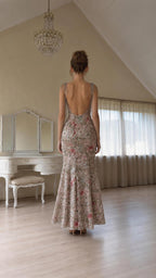 Back view of model showing open back and tie straps