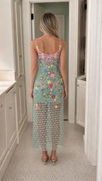 Back view of mint green floral sequin midi dress
