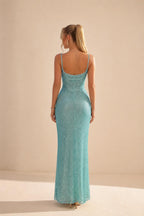 Back view of model in light blue sparkling maxi dress