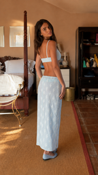Back side view of powder blue embroidered crop top and maxi skirt set