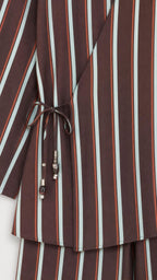 Close-up of wrap top side tie detail with beads