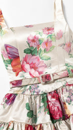 Close-up detail of bodice and belt on ivory floral dress