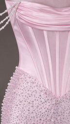 Close up detail of structured corset and beaded embellishments