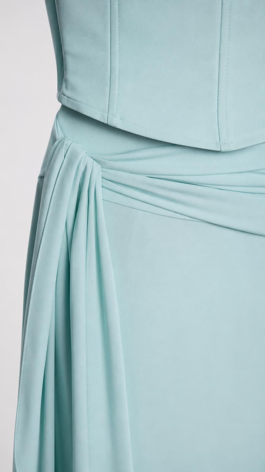 Close-up of fabric draping on the maxi skirt