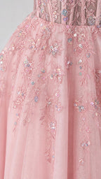 Close-up detail of floral appliques and sequins on bodice