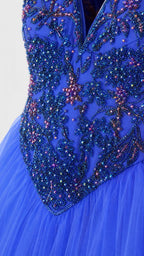 Close-up of beaded and embroidered bodice detail