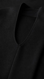 Close up of textured fabric and halter neckline