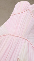 Close-up of pink pleated chiffon bodice and braided trim
