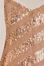 Close-up of sequin texture and V-neckline details