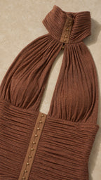 Close-up detail of the halter collar and ruched bodice