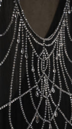 Close-up detail of crystal beading web pattern