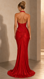 Back view of red halter evening gown with train