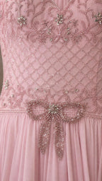 Close-up of beaded bodice and waist bow detail