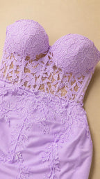 Close-up detail of sweetheart neckline and sheer lace bodice