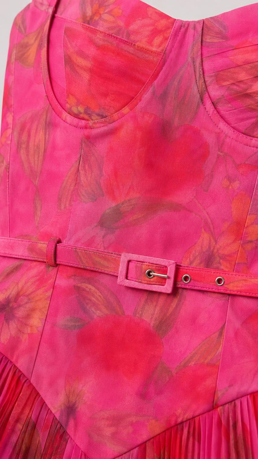 Close up of bodice and belt detail on pink dress