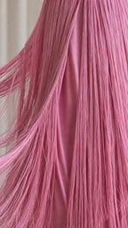Close-up detail of fine pink fringe texture