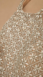 Close-up detail of the intricate crystal beadwork
