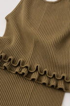 Close-up detail of lettuce-edge ruffle on olive knit fabric