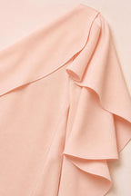 Close-up detail of the layered ruffle sleeve on the peach dress