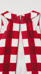 Close-up of the red gingham pattern and neckline construction