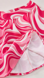 Close-up of the fabric texture and interior lining of the swirl print skirt