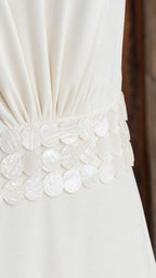 Close-up detail of the sequin-embellished waistband