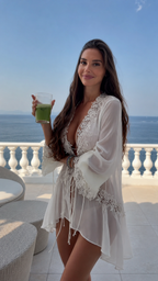 Close-up of white lace trim deep V beach cover up with front tie