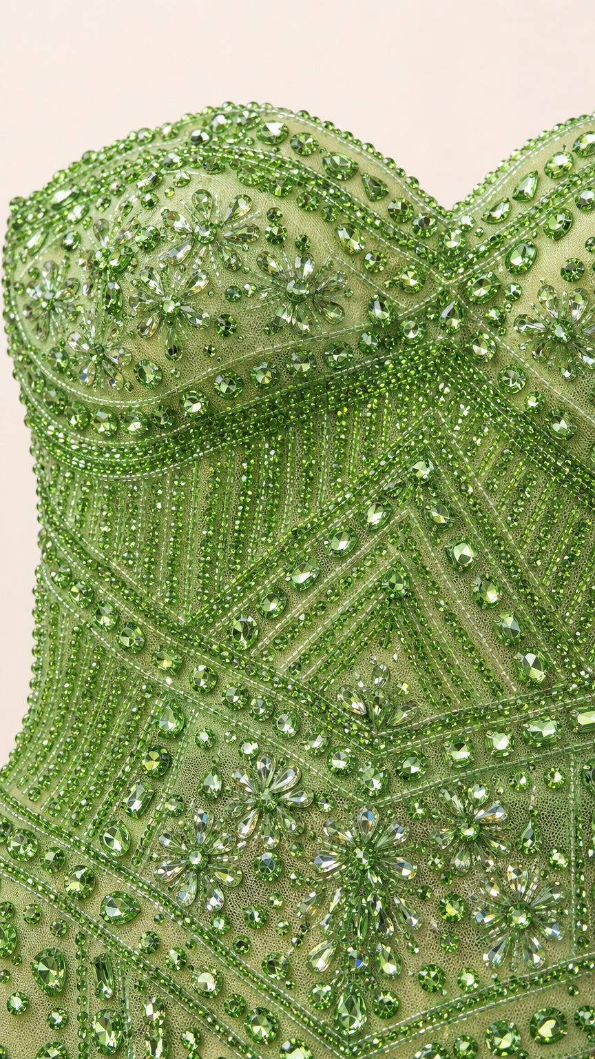 Close-up detail of the intricate green bead and crystal embellishments