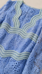 Close-up detail of lace pattern and contrast trim