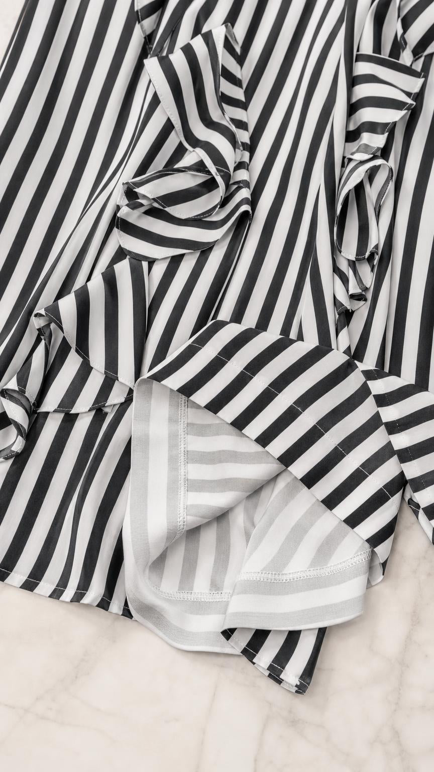 Close-up detail of fabric, ruffles, and stripes