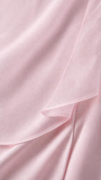 Close-up of the sheer cape fabric texture in Pink