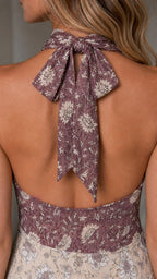Close-up of back tie bow and halter neckline detail