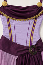 Close-up detail of corset bodice and gold trim on purple dress