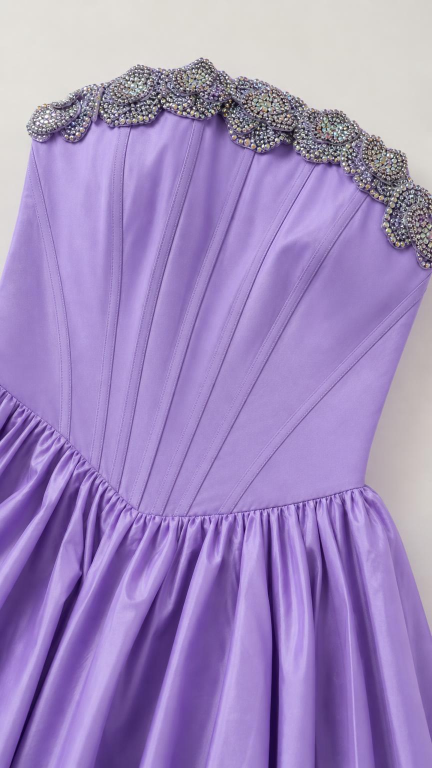Close-up detail of embellished crystal beaded neckline and bodice