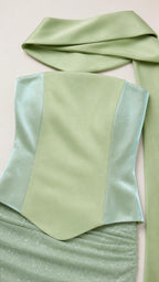 Close-up of sage satin bodice and matching scarf fabric
