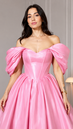 Close-up of pink sweetheart corset-style bodice with off shoulder puff sleeves
