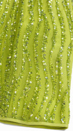 Close-up detail of vertical wavy sequin and bead embellishments